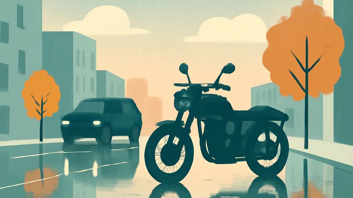 A motorcycle and a car on a wet city street with buildings and trees under a cloudy sky