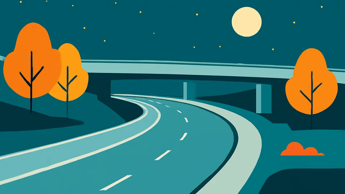 A highway curves under an overpass at night, with orange trees and a full moon in a dark blue sky