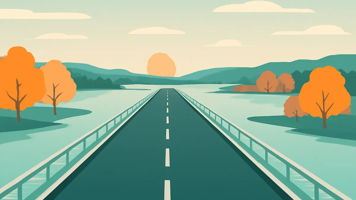 A straight road with white dashed lines extends into the distance, flanked by a river and trees with orange foliage