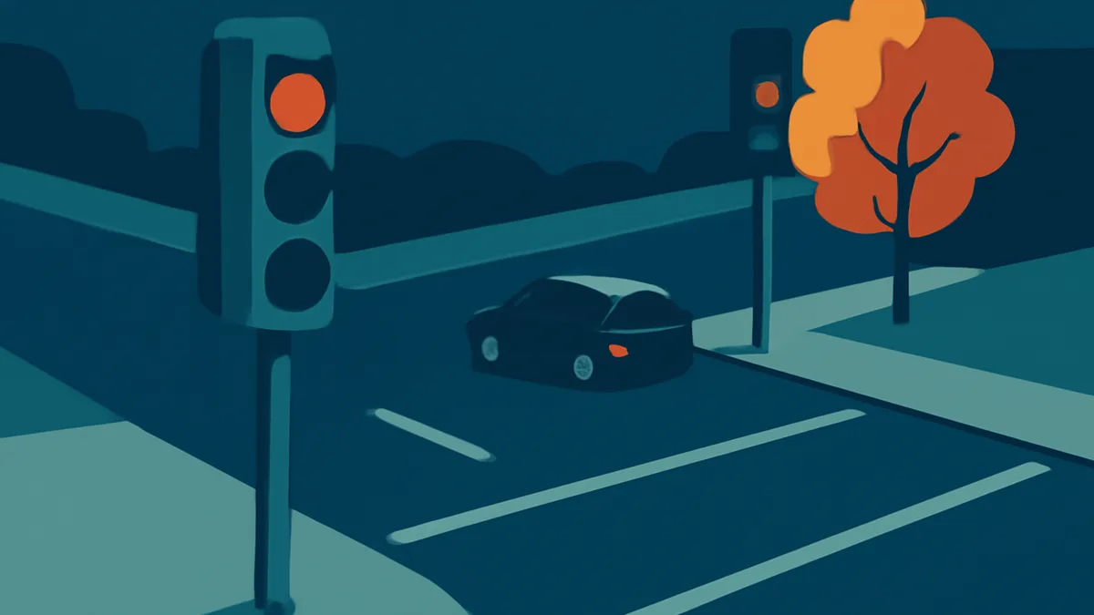 A dark blue car at an intersection with a red traffic light and an orange tree, in a flat, stylized illustration