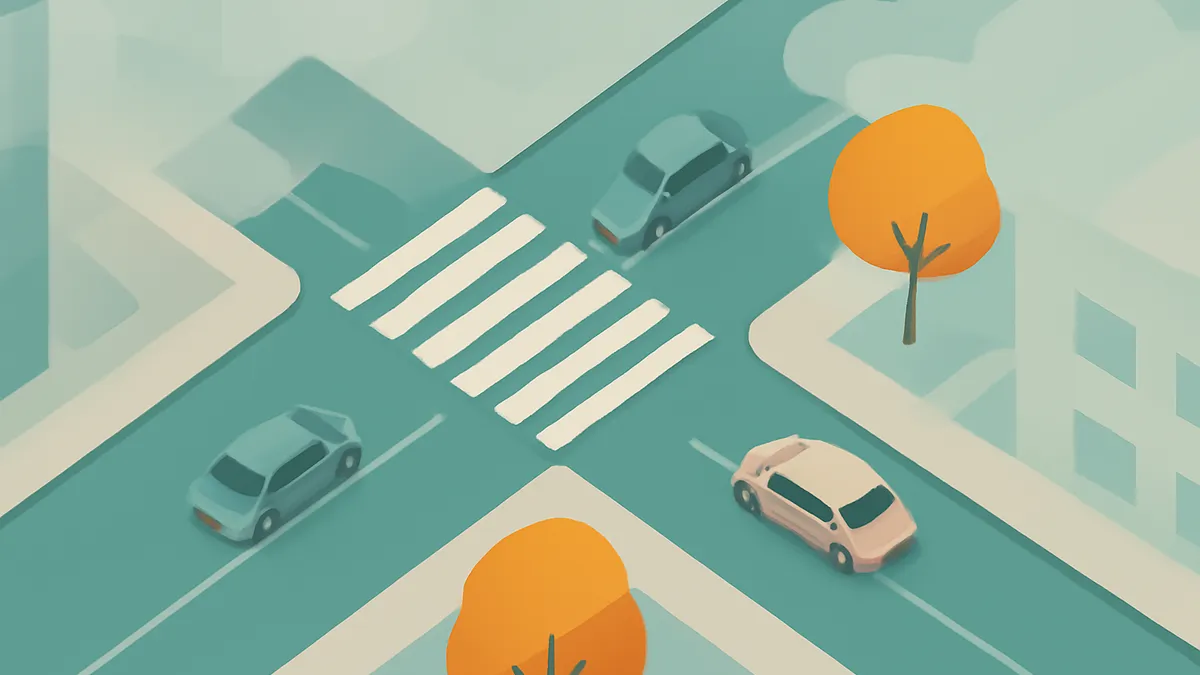 An overhead view of a city intersection with three cars and two trees in a flat, minimalist style