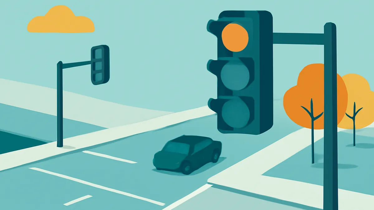 A teal car at an intersection with a traffic light showing orange, with orange trees and a cloud