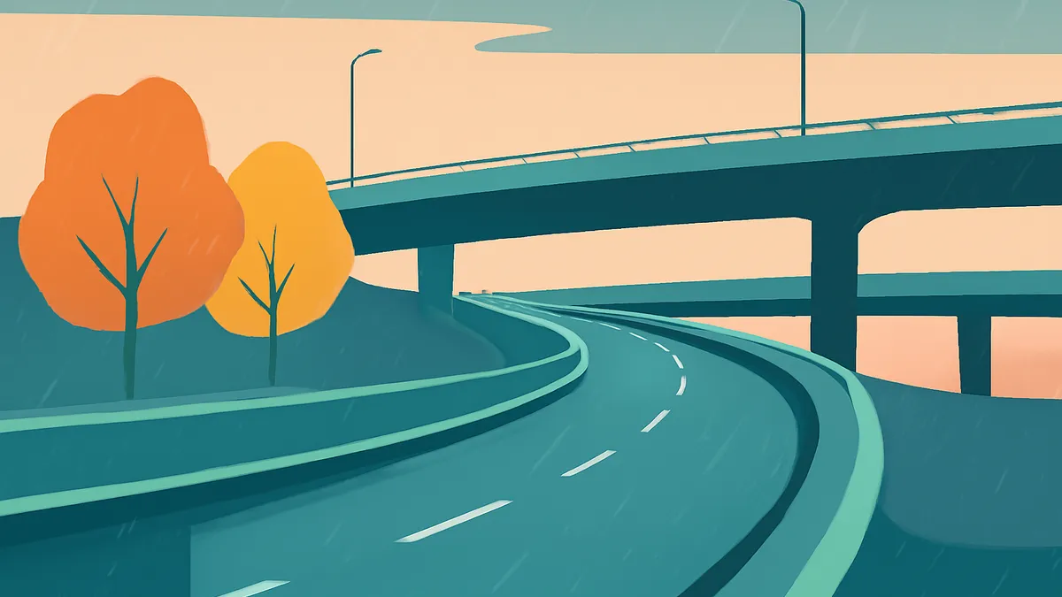 A highway overpass and a curving road below, with two orange trees on a grassy bank, under a pale sky