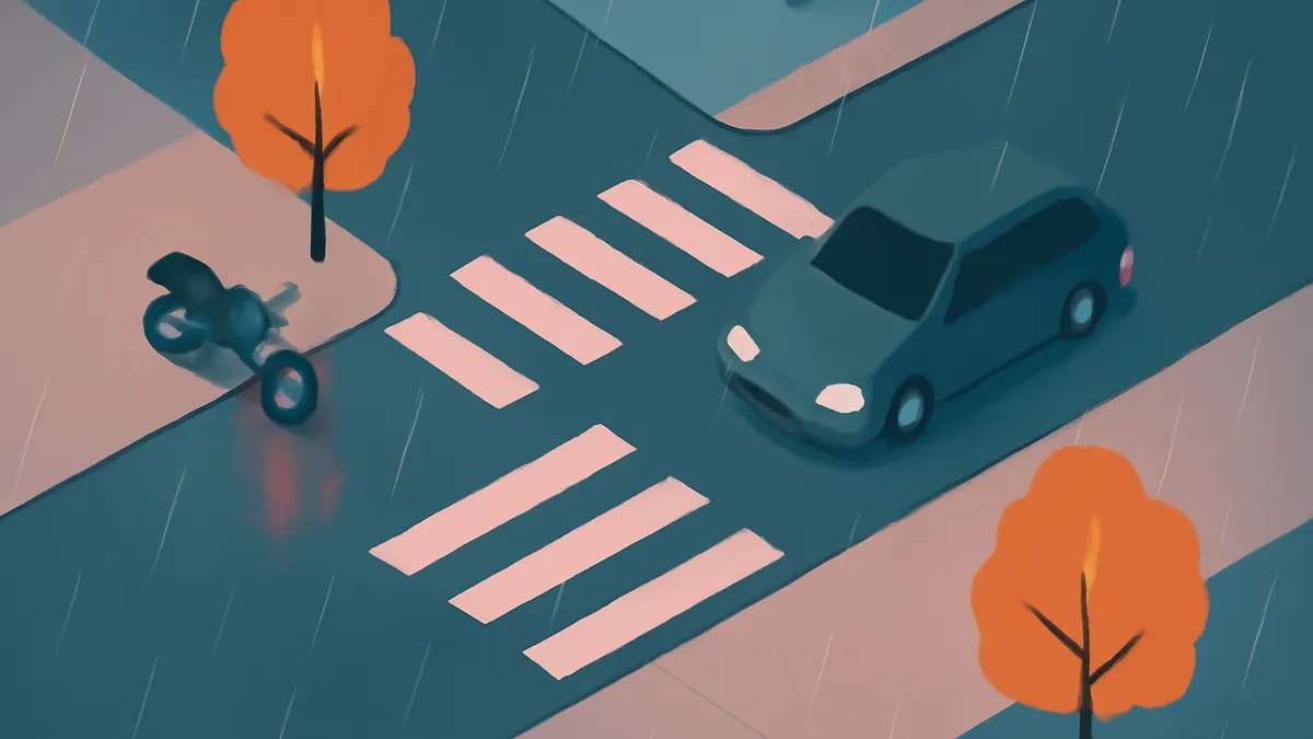 A teal car and a motorcycle on a wet road with a crosswalk and two orange trees in the rain