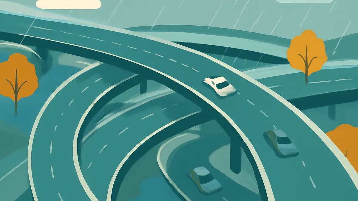 An overhead view of a multi-level highway interchange with three cars on the roads, in teal and orange tones