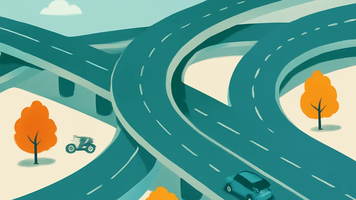 An overhead view of a complex highway interchange with multiple teal-colored roads curving and crossing over each other. Two