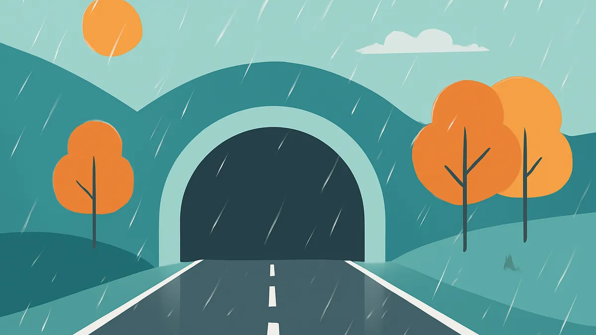 A road leading into a tunnel on a rainy day, with orange trees and a sun in the sky