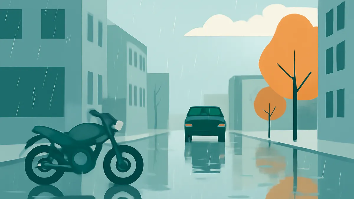 A motorcycle and a car on a wet street in a city with buildings and trees, under a rainy sky