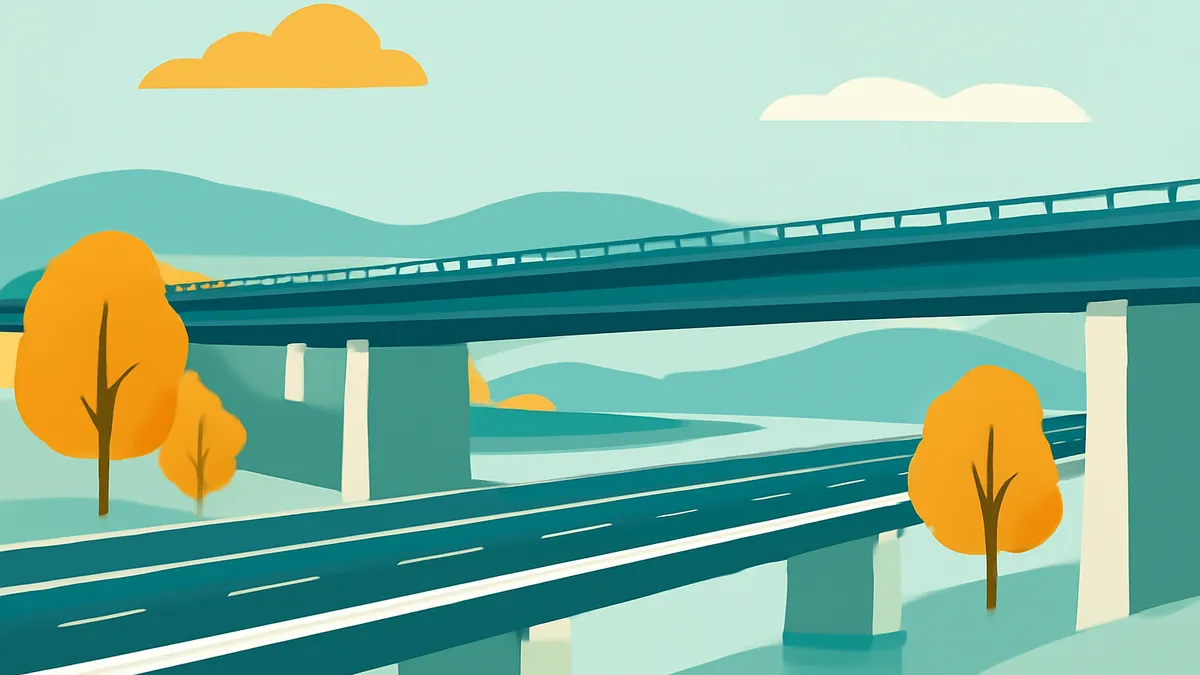 A highway overpass with a river and mountains in the background, with trees in the foreground