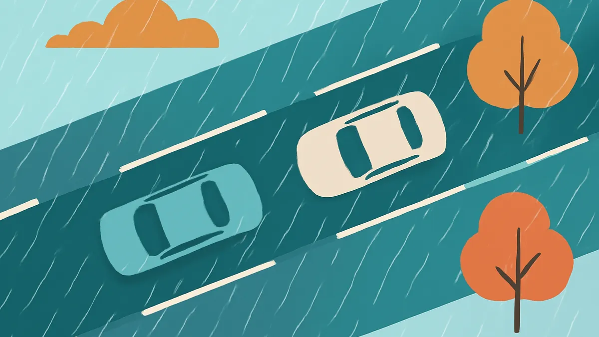 Two cars, one blue and one white, drive on a rainy road with a cloud and two trees