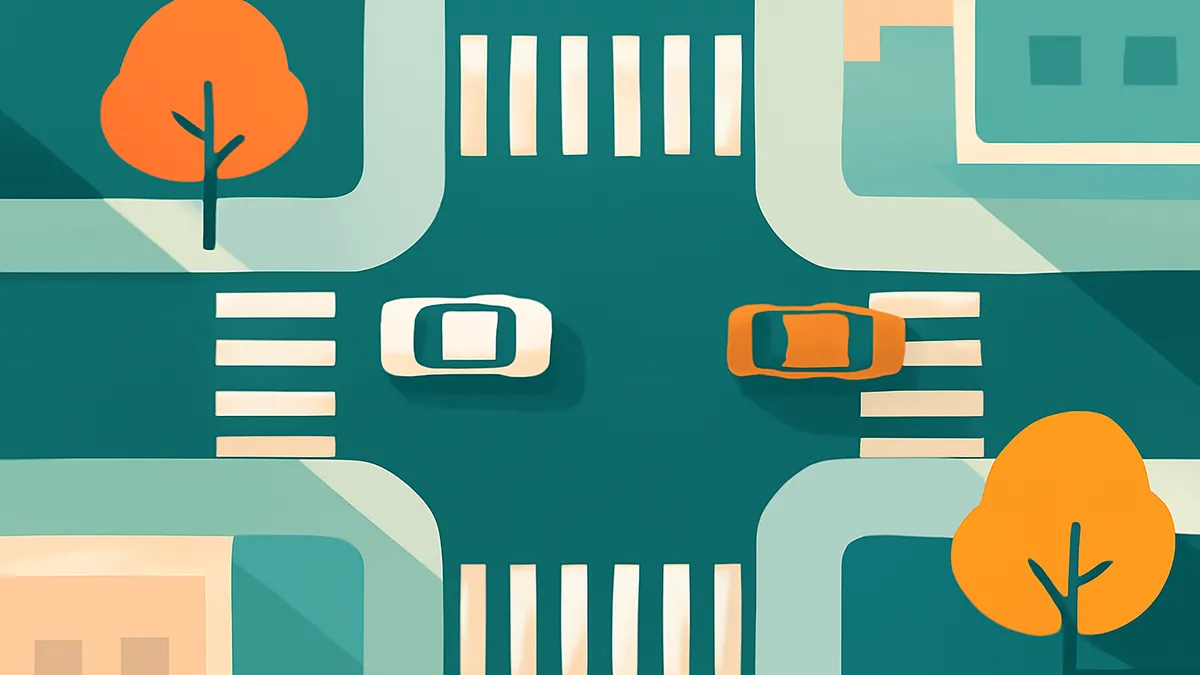 An overhead view of a teal intersection with two cars, one white and one orange, and two orange trees