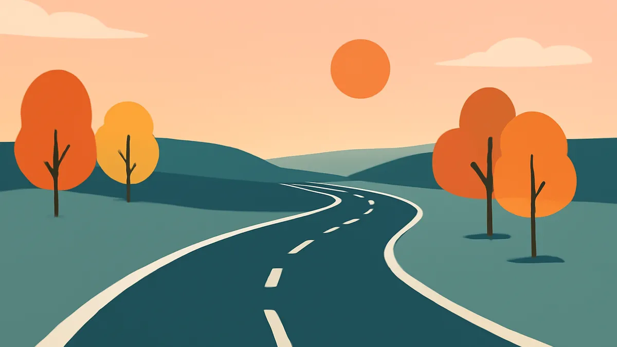 A winding road through rolling hills with autumn trees under a peach sky with a large orange sun